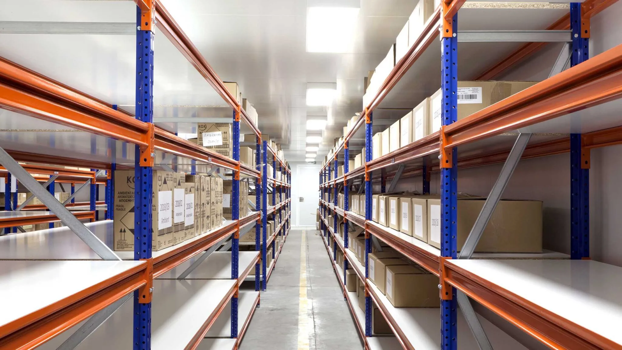 Longspan shelving being used for heavy duty archive and parts storage in an office building