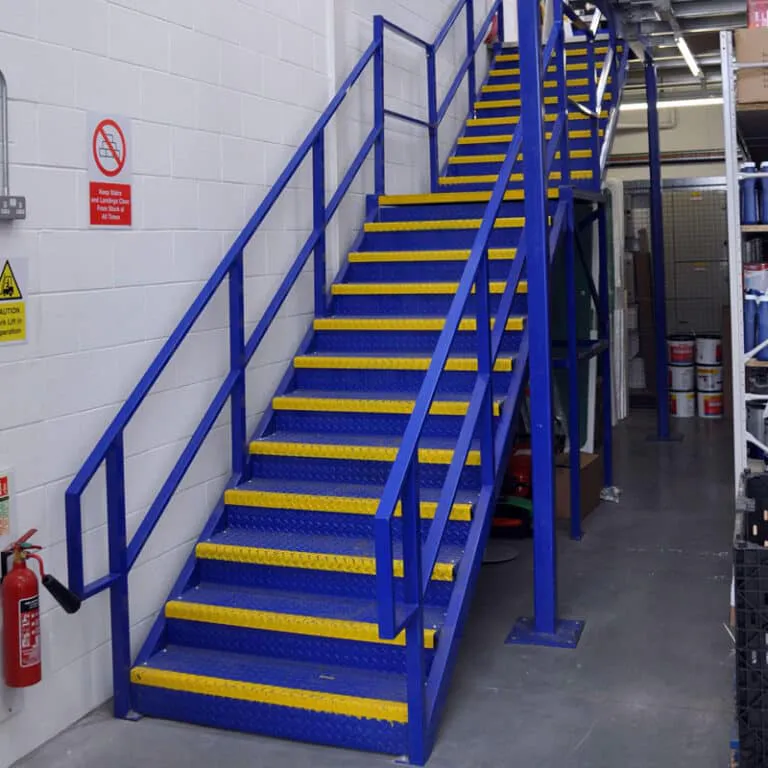 Powder coated Steel staircase with safety nosing's and handrailing